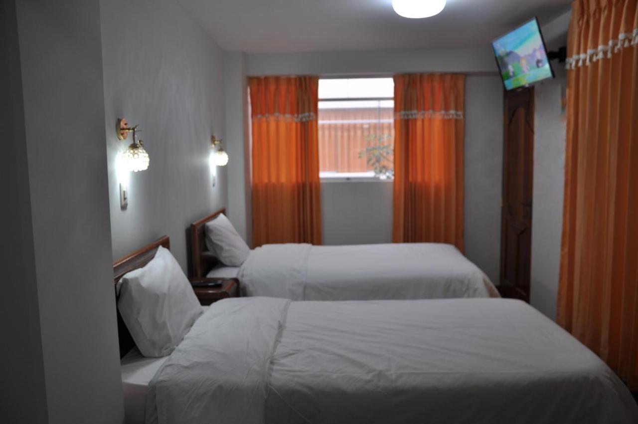 Cesar'S Hotel Peru Puno Bagian luar foto